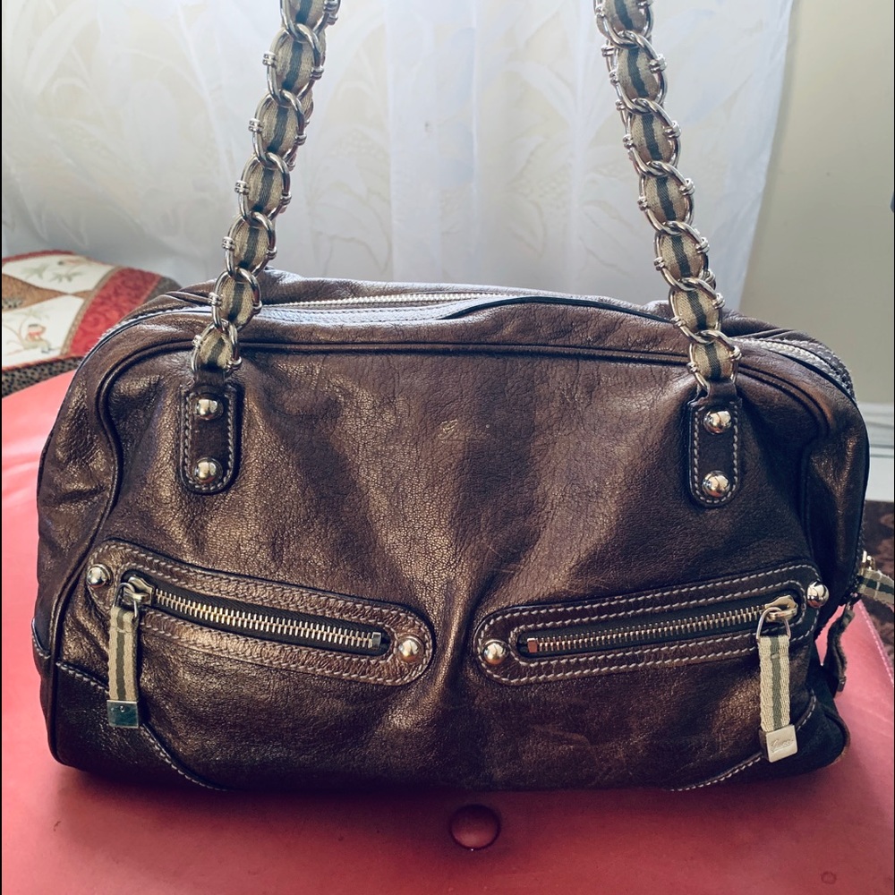 Vintage Gucci bronze metallic purse.